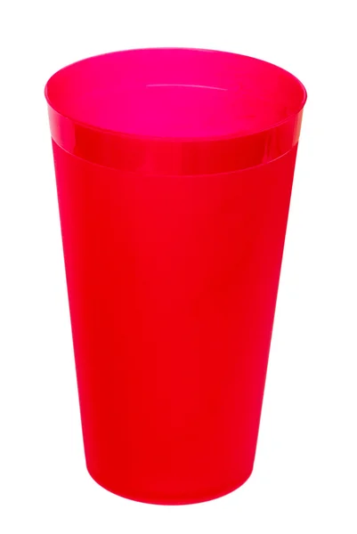 Vidro de plástico vermelho para suco, isolado em fundo branco . — Fotografia de Stock